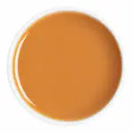A circular color swatch showing a warm, glossy orange-brown hue with a subtle white highlight on the left edge.