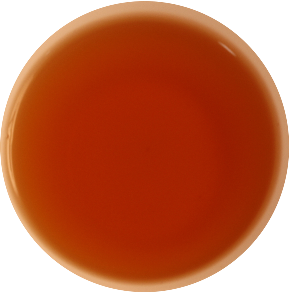 A circular color swatch showing a warm, translucent amber-orange hue on a plain white background.