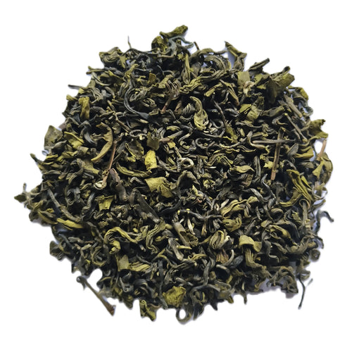 A pile of loose-leaf green tea leaves, showing their curly, rolled texture, photographed on a solid white background.