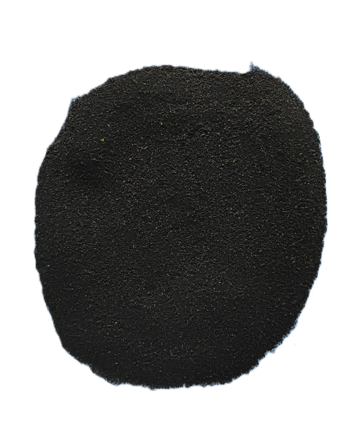A pile of fine black powder or granules, photographed from above on a plain white background.