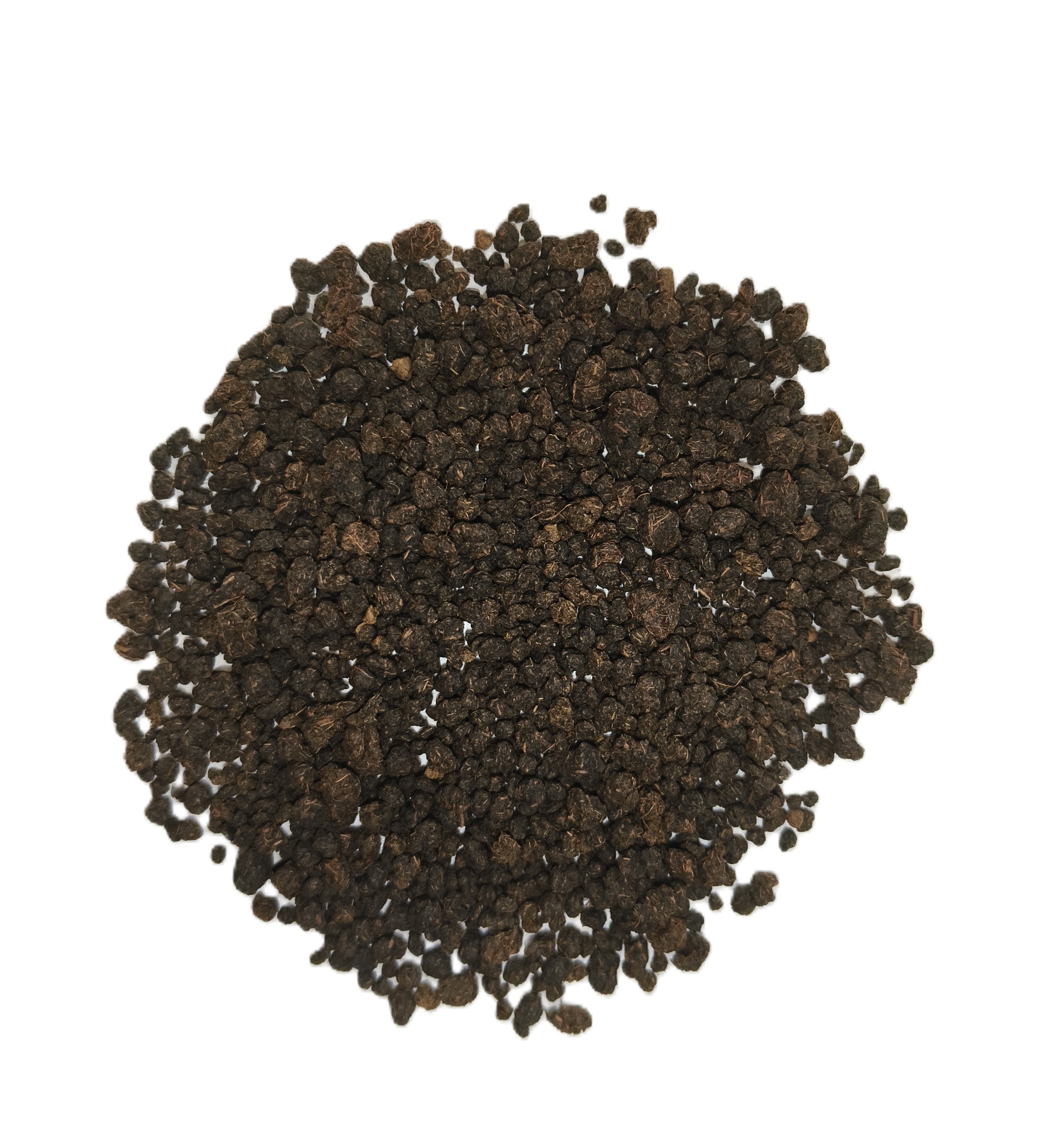 A pile of dark brown textured granules, likely coffee beans or coffee grounds, photographed from directly above on a solid white background.