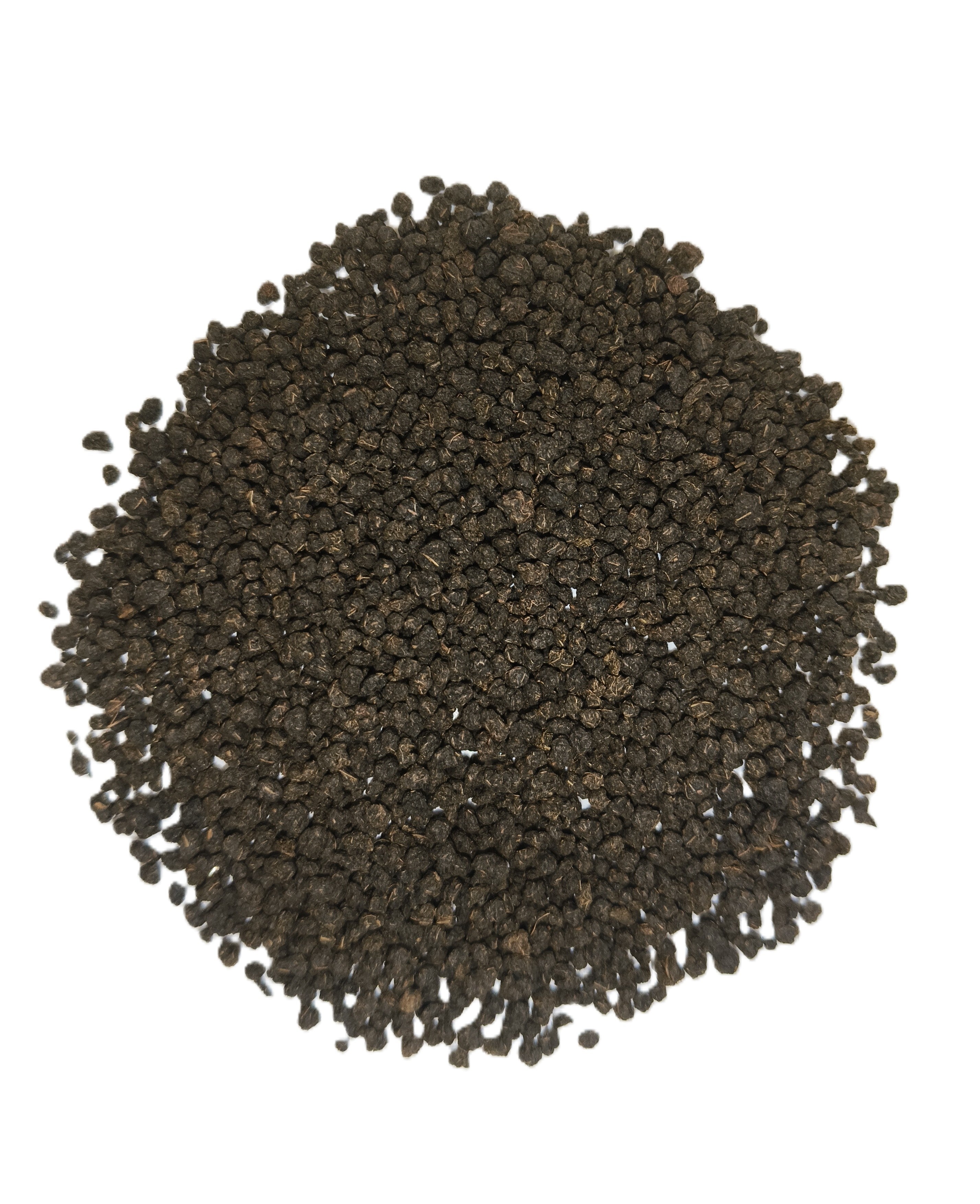 A pile of dark brown to black peppercorns arranged in a circular mound on a plain white background.