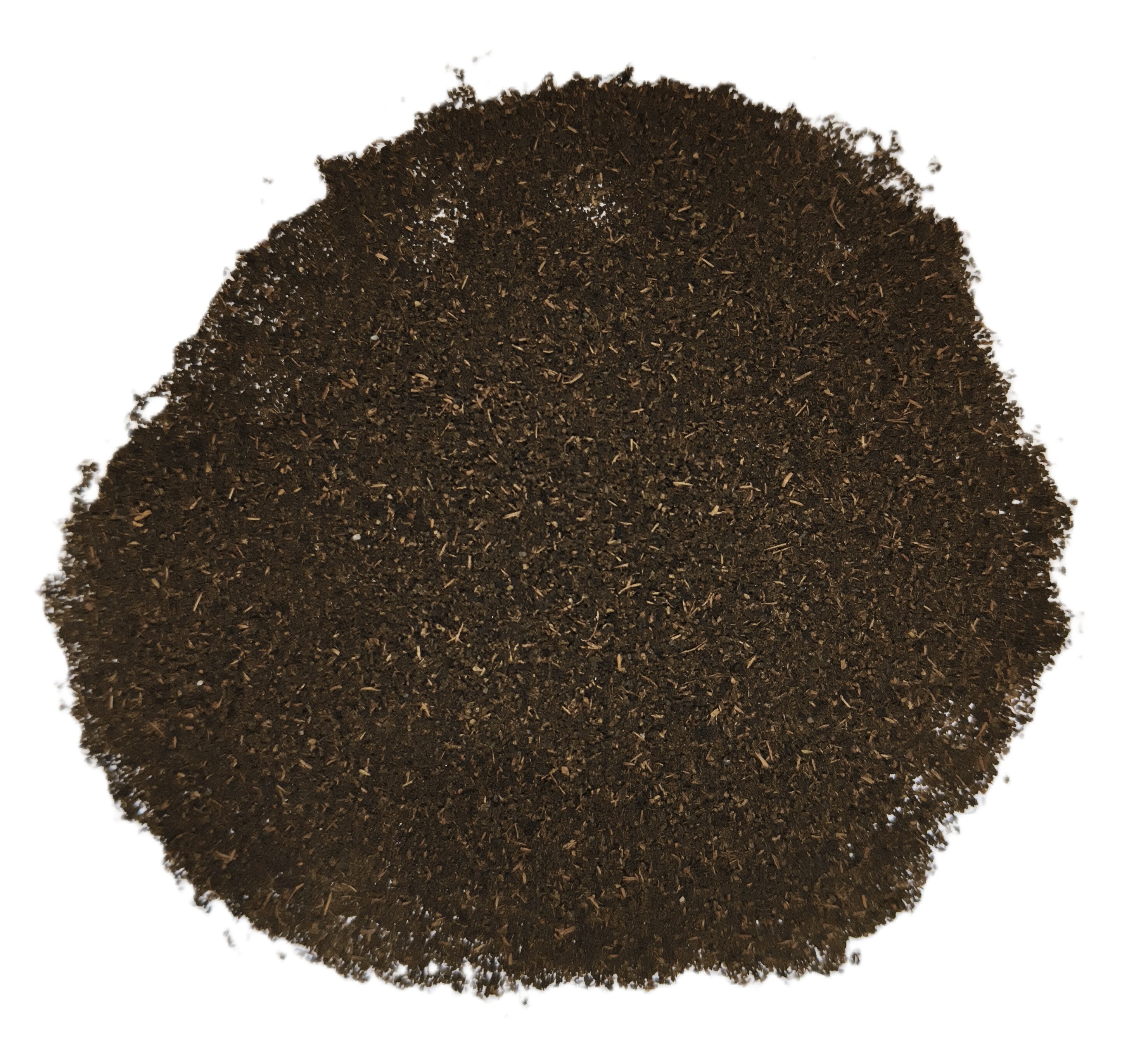 A pile of dark brown loose-leaf tea or herb blend on a plain white background.