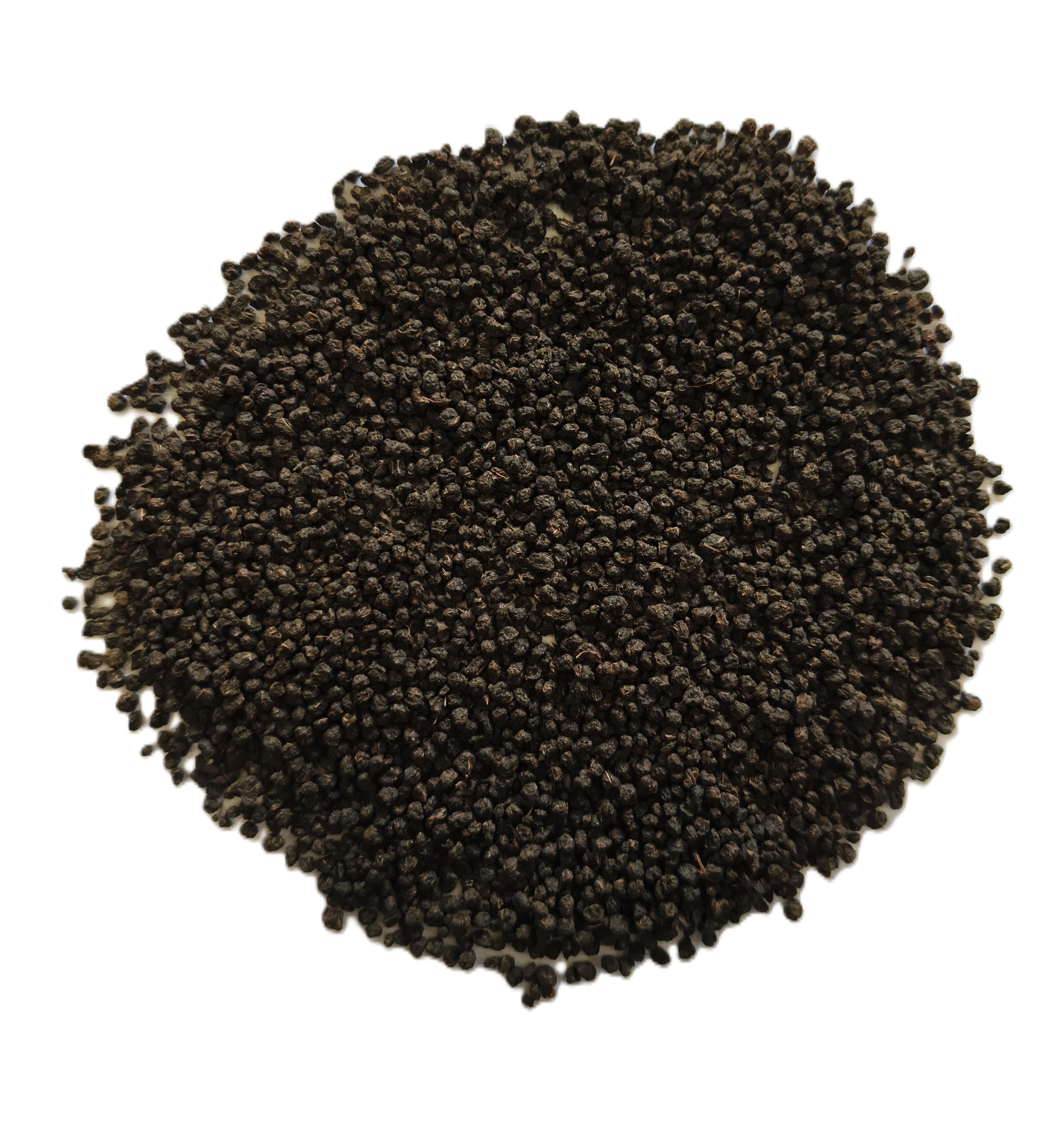 A pile of small dark brown to black seeds, likely sesame seeds, photographed from directly above on a plain white background.