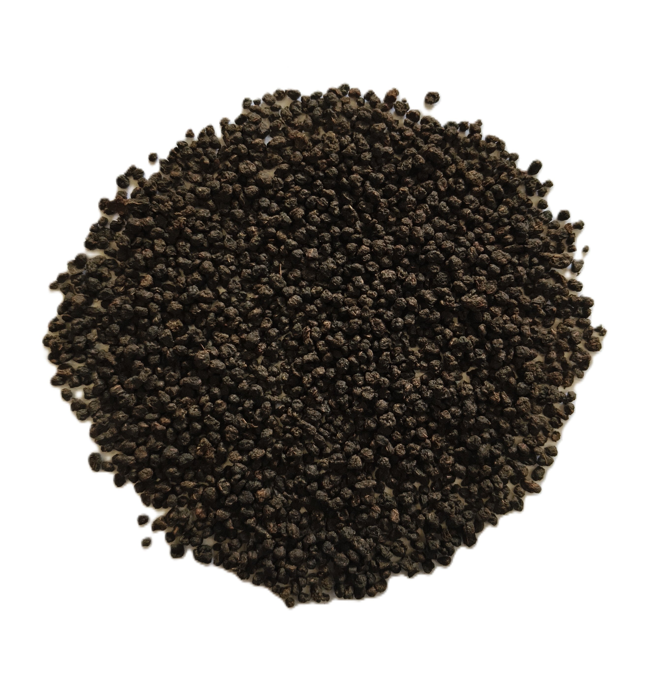 A pile of dark brown to black textured granules, likely coffee beans or ground coffee, photographed from directly above on a solid white background.
